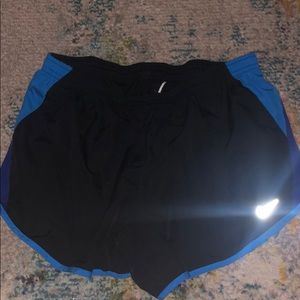 Nike shirt and running shorts